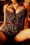 MariPossa posing in her leopard print lingerie